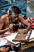 Street life around the Sri Meenakshi-Sundareshwarar Temple of Madurai. Tamil Nadu.  